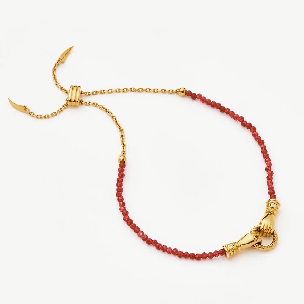 Elegant Gold and Red Bracelet